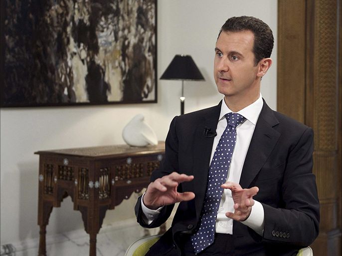 A handout picture made available by the Syrian Presidency on 11 December 2015, shows Syrian President, Bashar Al-Assad, speaking during an exclusive interview with Spanish news agency EFE, on 10 December 2015.