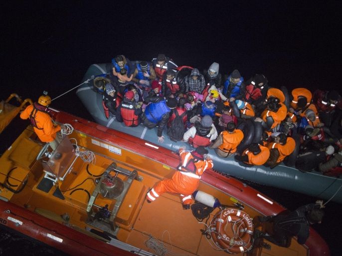 A picture made avaliable on 10 December 2015 shows Members of Turkish Coastal Guard ship UMUT bring some Syrian refugees on a boat after they attempted to reach Greek Island Chios at the Agean Sea in Cesme district near Izmir, coastal city of Turkey, 09 December 2015. The migrants, mostly from Iran, Bangladesh, Pakistan and Morocco, were placed on buses, some forcibly, and transported to shelters in Athens 550 kilometres to the south, reports said. Around 1,200 people had been stranded at the border since Macedonia started denying entry to so-called economic migrants trying to reach Western Europe via the Balkan route, which stretches from Turkey, through Greece, Macedonia, Serbia, Croatia, Slovenia and finally to Austria. In Athens, they will have to apply for asylum or be repatriated. Greek police sealed Idomeni on 09 December morning, also blocking access to reporters and humanitarian workers.