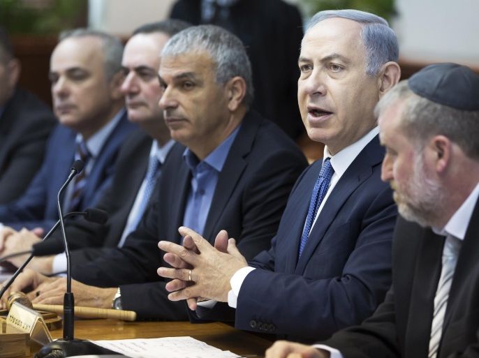 Israel's Prime Minister Benjamin Netanyahu, second right, chairs the weekly cabinet meeting in Jerusalem, Sunday, Dec. 6, 2015. (Pool Photo via AP)