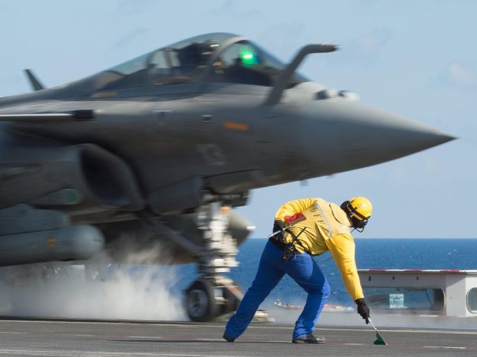 A handout picture issued by the French Ministry of Defense on 23 November 2015 shows a French military jet part of the Mission Arromanches 2 in Iraq against the Islamic State group taking off from the Charles de Gaulle aircraft carrier, deployed in the Mediterranean Sea, 23 November 2015. The French Air Force on 15 November 2015 launched a massive campaign of airstrikes against IS. The airstrikes come after 130 people were killed and some 350 injured in the terror attacks which targeted the Bataclan concert hall, the Stade de France national sports stadium, and several restaurants and bars in Paris on 13 November. EPA/ECPAD / HANDOUT TO BE USED WITHIN 30 DAYS FROM 23 NOVEMBER 2015 HANDOUT EDITORIAL USE ONLY/NO SALES