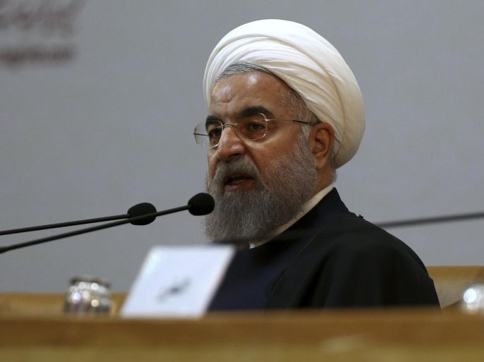 Iranian President Hassan Rouhani speaks during the 29th International Islamic Unity Conference in Tehran, Iran, Sunday, Dec. 27, 2015. Rouhani accused Saudi Arabia Sunday of promoting poverty and terrorism by continuing to bomb Yemeni rebels and supporting armed rebels fighting to topple Syrian President Bashar Assad in Syria. (AP Photo/Vahid Salemi)
