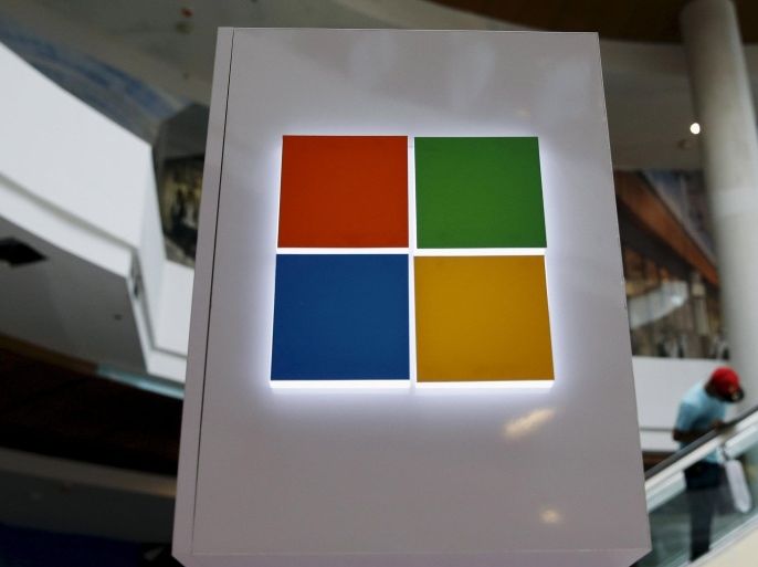 A Microsoft logo is seen at a pop-up site for the new Windows 10 operating system at Roosevelt Field in Garden City, New York in this July 29, 2015 file photo. Microsoft is to release their Q1 results on October 22, 2015. REUTERS/Shannon Stapleton/Files GLOBAL BUSINESS WEEK AHEAD PACKAGE - SEARCH "BUSINESS WEEK AHEAD OCTOBER 19" FOR ALL 37 IMAGES