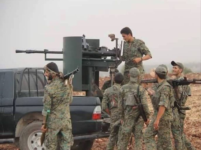عناصر من وحدات حماية الشعب الكردية في ريف حلب الشرقي (وحدات حماية الشعب)