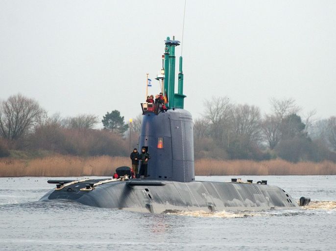 Israeli navy submarine 'Rahav' travels along the Nord-Ostsee-Kanal near Rendsburg, Germany, 17 December 2015. The vessel, which was built in Kiel, is leaving Germany and is due to reach Israel in January 2016.