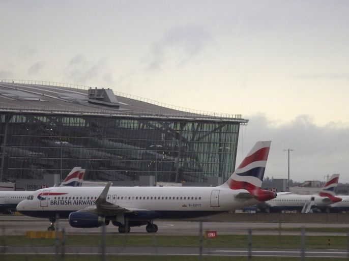 A British Airways plane taxis at Heathrow Airport near London, Britain, December 11, 2015. REUTERS/Neil Hall