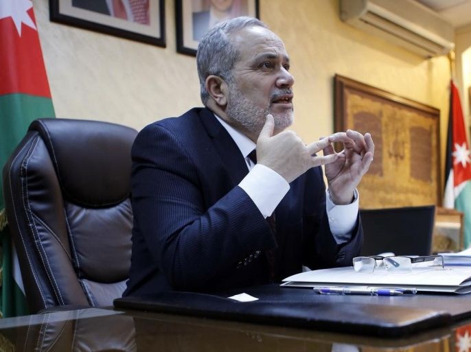 In this photo taken on April 16, 2015, Jordan's religious affairs minister Haeli Abdul Hafeez Daoud speaks during an interview with The Associated Press in Amman, Jordan. Among preachers, the government hopes to promote a "moderate Islamic ideology that is in line with our national principles," said Daoud. As part of the country's anti-extremist campaign, the ministry suspended several dozen imams because of the content of their sermons. (AP Photo/Raad Adayleh)