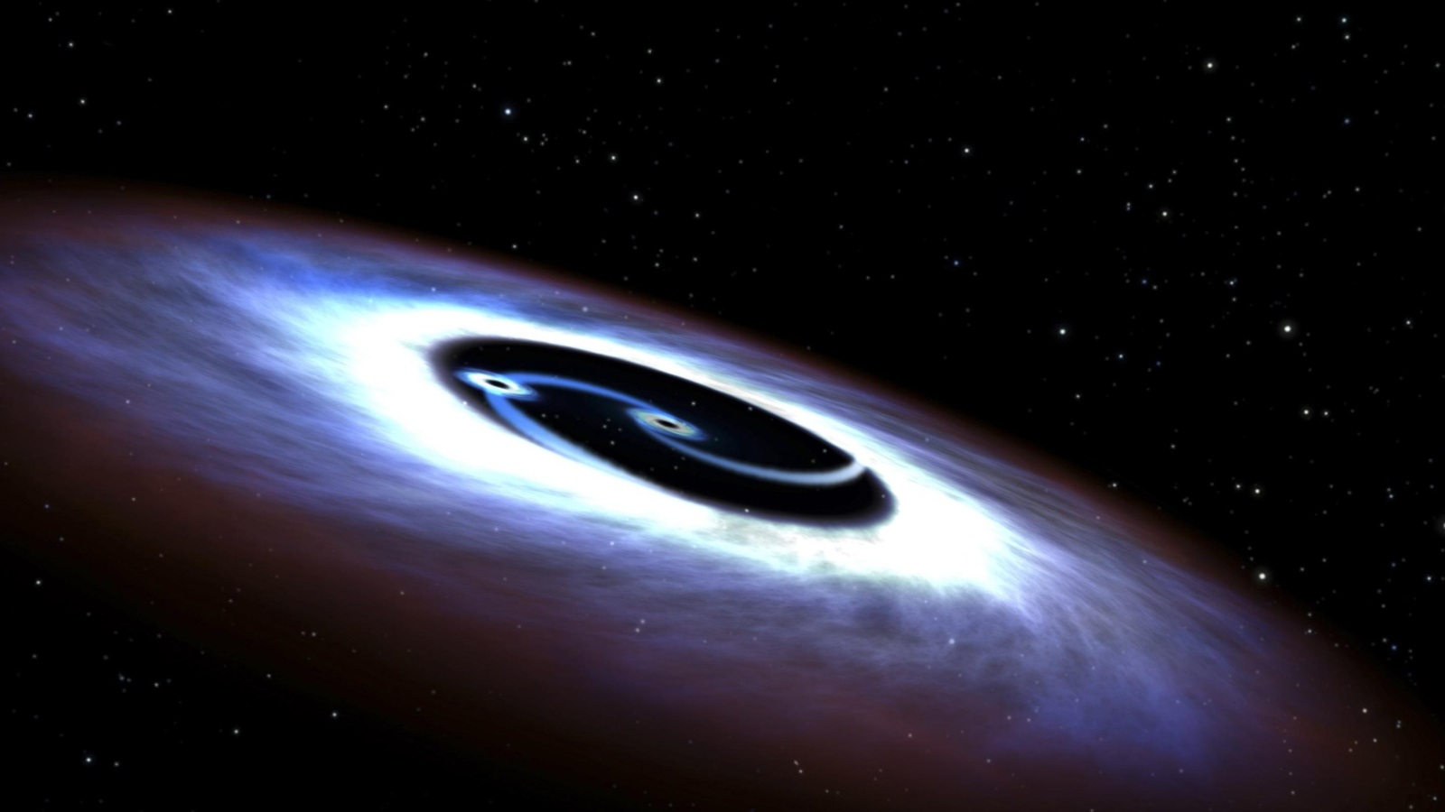 ‪نظام ثنائي فريد من ثقبين أسودين اكتشفه علماء الفلك العام الماضي في أقرب المجرات إلينا‬ (رويترز)