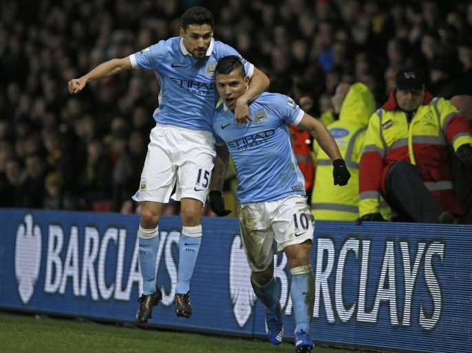 JR453 - Watford, Hertfordshire, UNITED KINGDOM : Manchester City's Argentinian striker Sergio Aguero celebrates with Manchester City's Spanish midfielder Jesus Navas (L) after scoring their second goal during the English Premier League football match between Watford and Manchester City at Vicarage Road Stadium in Watford, north of London on January 2, 2016. AFP PHOTO / ADRIAN DENNIS
