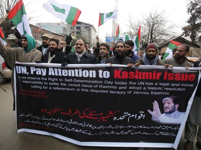 Supporters of the separatist Democratic Freedom Party (DFP) shout slogans during a protest in Srinagar, the summer capital of Indian Kashmir, 05 January 2016. Police detained some separatist activists as they were protesting and demanding the implementation of the 05 January 1949 UN resolution which called for a referendum on the disputed Himalayan region.