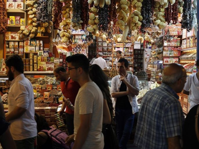 People walk around the iconic Spice Bazaar, in the historic Sultanahmet district of Istanbul, Turkey, Wednesday, June 17, 2015. Millions of Muslims around the world will mark the start of Ramadan on Thursday June 18, a month of intense prayer, dawn-to-dusk fasting and nightly feasts. Muslims follow a lunar calendar and a moon-sighting methodology that can lead to different countries declaring the start of Ramadan a day or two apart. (AP Photo/Emrah Gurel)