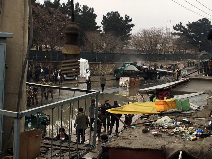 Afghan security officials inspect the scene of a suicide bomb attack at police checkpoint near Kabul International Airport in Kabul, Afghanistan, 04 January 2016. A suicide bomber detonated his explosives at a police checkpoint near Kabul airport, officials said. There were no immediate reports of casualties or injuries. General Ahmad Farid Afzali, head of the Kabul police criminal investigation unit, said that the bomber blew up his explosives inside a vehicle near the checkpoint.