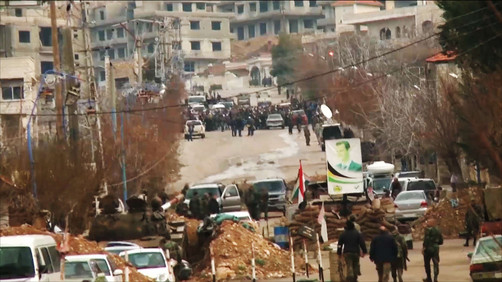 ‪حاجز لقوات النظام بمحيط مدينة مضايا المحاصرة‬ حاجز لقوات النظام بمحيط مدينة مضايا المحاصرة (الجزيرة)