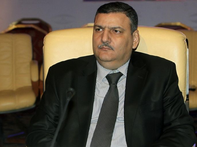 Former Syrian Prime Minister Riad Hijab attends a meeting of the Syrian National Coalition for Opposition and Revolutionary Forces, formed after the Syrian National Council (SNC), in Doha, Qatar, on Sunday, Nov. 11, 2012. (AP Photo/Osama Faisal)