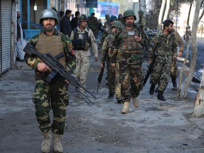 Afghan soldiers arrive at the scene of a suicide bomb attack near the Pakistani consulate in Jalalabad, Afghanistan, 13 January 2016. At least four persons were killed as fighting continued between Afghan forces and Taliban militants who launched attacks at the Pakistani consulate in Jalalabad.