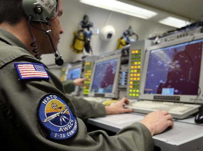 A controller monitors is seen screening aboard a NATO AWACS (Airborne Warning and Control Systems) aircraft during a surveillance flight over Romania in this April 16, 2014 file photo. The head of NATO said on January 28th, 2016 that the United States has requested the alliance's help in fighting Islamic State in the Middle East by providing surveillance planes called the Airborne Warning and Control System (AWACS).REUTERS/Francois Lenoir/Files