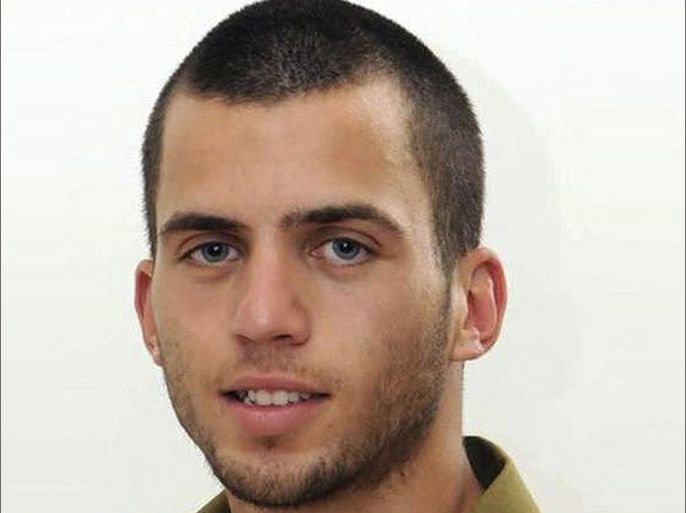 Missing Israeli soldier Oron Shaul is pictured in this undated handout picture obtained by Reuters on July 22, 2014. Israel said on Tuesday it had failed to trace any remains of the soldier whom it believes died in the Gaza Strip two days ago, and whom Hamas has said it captured. The Israeli military named the missing man as Oron Shaul, 21, who was travelling in an armoured vehicle that was hit with an anti-tank missile fired at it by Palestinian fighters in Gaza on Sunday. REUTERS/Handout via Reuters (MILITARY POLITICS HEADSHOT TPX IMAGES OF THE DAY CONFLICT) ATTENTION EDITORS - THIS PICTURE WAS PROVIDED BY A THIRD PARTY. REUTERS IS UNABLE TO INDEPENDENTLY VERIFY THE AUTHENTICITY, CONTENT, LOCATION OR DATE OF THIS IMAGE. THIS PICTURE IS DISTRIBUTED EXACTLY AS RECEIVED BY REUTERS, AS A SERVICE TO CLIENTS. NO SALES. NO ARCHIVES. FOR EDITORIAL USE ONLY. NOT FOR SALE FOR MARKETING OR ADVERTISING CAMPAIGNS