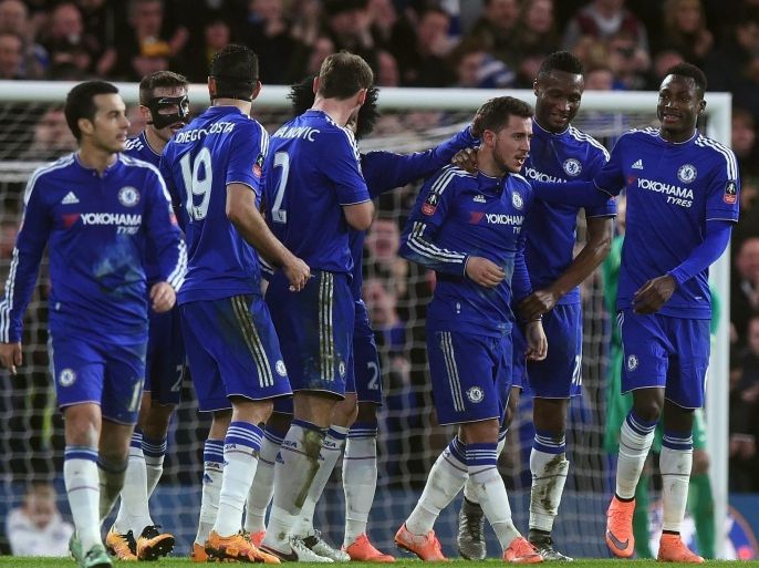 Chelsea's Eden Hazard (3rd R) is congratulated by teammates after scoring during the FA Cup match between Chelsea and Manchester City at Stamford Bridge, London, Britain, 21 February 2016. EDITORIAL USE ONLY. No use with unauthorized audio, video, data, fixture lists, club/league logos or 'live' services. Online in-match use limited to 75 images, no video emulation. No use in betting, games or single club/league/player publications