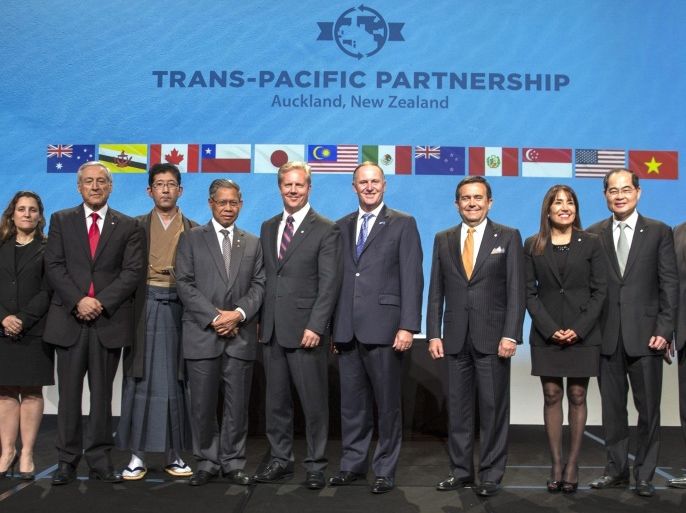 A handout photo provided by the New Zealand Ministry of Foreign Affairs and Trade (MFAT) shows delegates posing for a group photo after the signing of the Trans Pacific Partnership trade agreement in Auckland, New Zealand, 04 February 2016. The Trans-Pacific Partnership (TPP) involves a dozen countries bordering the Pacific Ocean. It is being touted as the most significant trade deal in a generation. The signatories comprise Australia, Brunei, Canada, Chile, Japan, Malaysia, Mexico, New Zealand, Peru, Singapore, the United States and Vietnam. Member states have a combined population of 800 million. The members account for 40 per cent the world economy. EPA/PETER MEECHAM / HANDOUT