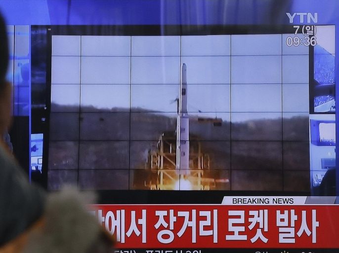 FILE - In this Feb. 7, 2016, photo, a South Korean man watches a TV news program with a file footage about North Korea's rocket launch at Seoul Railway Station in Seoul, South Korea. North Korean nuclear and rocket tests are drawing quick responses from the U.S. that will upset a supposed partner against Pyongyang's weapons development _ China. New efforts to toughen missile defense in South Korea and sanctions legislation moving swiftly through Congress could both hurt Chinese interests. The Chinese are concerned the missile defense system could be used against them, and the U.S. sanctions could hit Chinese companies that trade with North Korea. (AP Photo/Ahn Young-joon)