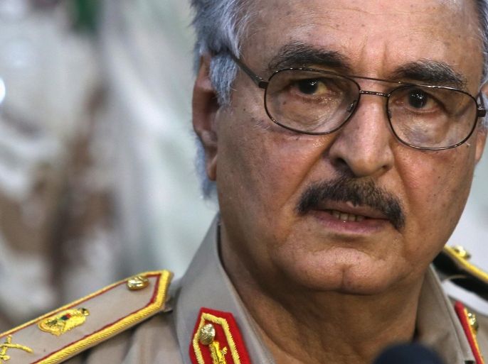 Then-General Khalifa Haftar speaks during a news conference at a sports club in Abyar, east of Benghazi May 21, 2014. Growing frustration over the reality of life in eastern Libya, which contrasts with the promises of politicians, is feeding support for Haftar, who has set himself up as a warrior against Islamist militancy and who some also see as their saviour. Picture taken May 21, 2014. REUTERS/Esam Omran Al-Fetori (LIBYA - Tags: CIVIL UNREST POLITICS MILITARY)