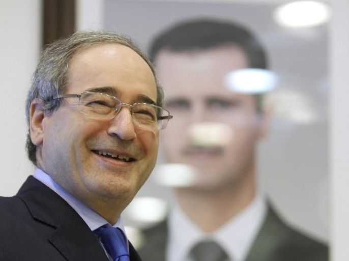 Syria's Deputy Foreign Minister Faisal Mekdad smiles as he attends an interview with Reuters in Damascus June 11, 2015. The Syrian government says it has weathered worse spells in the four-year-old conflict than the current advances by insurgents across the country and is confident its army can hit back with the help of its allies. The assessment offered by Deputy Foreign Minister Faisal Mekdad in an interview with Reuters in Damascus conflicts with the view of Western officials who see mounting pressure on President Bashar al-Assad from insurgent advances across Syria. Picture taken June 11, 2015. REUTERS/Omar Sanadiki