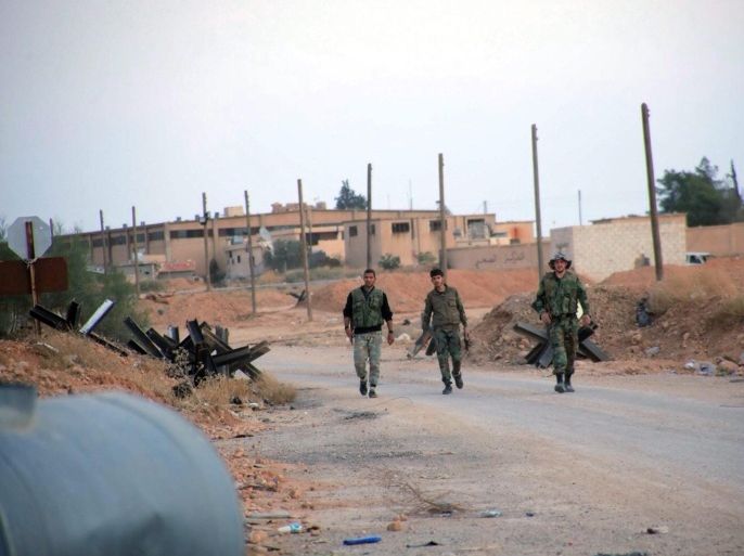 A handout picture made available by the Syrian Arab News Agency (SANA) shows members of the Syrian Arab Army (SAA) advancing along the Aleppo-Atheria-Khanasser highway after taking control of the road, Syria, 04 November 2015. Following increased Russian support in the form of military operations in the country the al-Assad regime's forces have made a series of renewed operations after suffering anumber of setbacks in previous months. EPA/SYRIAN ARAB NEWS AGENCY / HANDOUT