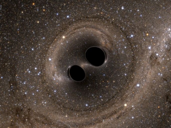 The collision of two black holes holes - a tremendously powerful event detected for the first time ever by the Laser Interferometer Gravitational-Wave Observatory, or LIGO - is seen in this still image from a computer simulation released in Washington February 11, 2016. Scientists have for the first time detected gravitational waves, ripples in space and time hypothesized by Albert Einstein a century ago, in a landmark discovery announced on Thursday that opens a new window for studying the cosmos. REUTERS/Caltech/MIT/LIGO Laboratory/Handout via Reuters FOR EDITORIAL USE ONLY. NOT FOR SALE FOR MARKETING OR ADVERTISING CAMPAIGNS. THIS IMAGE HAS BEEN SUPPLIED BY A THIRD PARTY. IT IS DISTRIBUTED, EXACTLY AS RECEIVED BY REUTERS, AS A SERVICE TO CLIENTS TPX IMAGES OF THE DAY