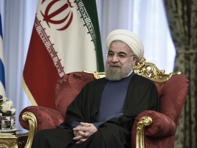 Iranian President Hassan Rouhani looks on during his meeting with Greek Prime Minister Alexis Tsipras (not pictured), in this handout photo released by the Greek Prime Minister's press office, in Tehran, Iran February 8, 2016. REUTERS/Andrea Bonetti/Greek PM Press Office/Handout via Reuters ATTENTION EDITORS - THIS PICTURE WAS PROVIDED BY A THIRD PARTY. REUTERS IS UNABLE TO INDEPENDENTLY VERIFY THE AUTHENTICITY, CONTENT, LOCATION OR DATE OF THIS IMAGE. FOR EDITORIAL USE ONLY. NOT FOR SALE FOR MARKETING OR ADVERTISING CAMPAIGNS. FOR EDITORIAL USE ONLY. NO RESALES. NO ARCHIVE. THIS PICTURE IS DISTRIBUTED EXACTLY AS RECEIVED BY REUTERS, AS A SERVICE TO CLIENTS
