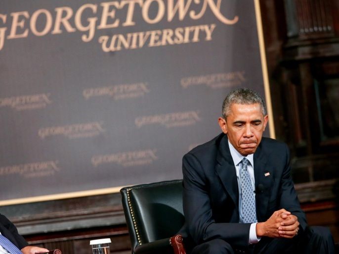 President Barack Obama pauses while speaking at the Catholic-Evangelical Leadership Summit on Overcoming Poverty at Georgetown University in Washington, Tuesday, May 12, 2015. The president said that "it's a mistake" to think efforts to stamp out poverty have failed and the government is powerless to address it. (AP Photo/Andrew Harnik)