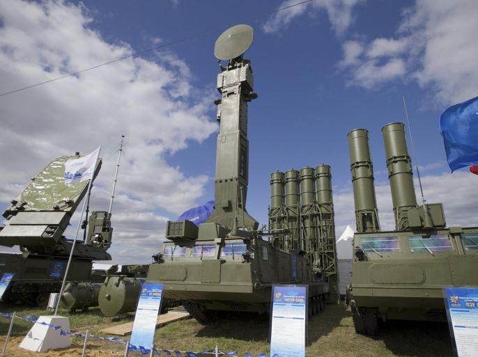 FILE - In this file photo taken on Tuesday, Aug. 27, 2013 a Russian air defense missile system Antey 2500, or S-300 VM, is on display at the opening of the MAKS Air Show in Zhukovsky outside Moscow. The head of a Russian state-controlled industrial conglomerate says the contract for the delivery of S-300 air defense missile systems to Iran has been finalized. (AP Photo/Ivan Sekretarev, File)