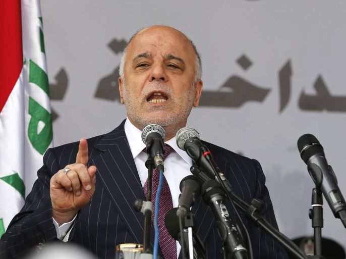 FILE - In this Saturday, Jan. 9, 2016, file photo, Iraq's Prime Minister Haider al-Abadi, speaks during a ceremony marking Police Day at the police academy in Baghdad, Iraq. The Iraqi Prime Minister is dismissing plans to build a wall around the Iraqi capital, according to a statement released by his office Saturday night. The plan for the wall was originally drafted by the Interior Ministry as an effort to prevent Islamic State group attacks inside Baghdad. (AP Photo/Karim Kadim, File)