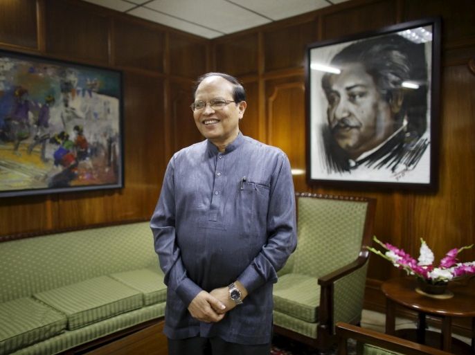 Bangladesh's central bank Governor Atiur Rahman poses inside his office in Dhaka in this October 2, 2013 file photo. Rahman said on March 15, 2016 he had resigned after $81 million was stolen from the bank's account at the New York Fed in one of the largest cyber heists in history. REUTERS/Andrew Biraj/Files