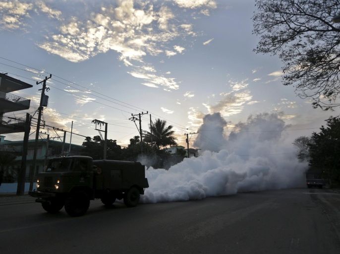 A military truck carries out fumigation in a neighborhood to stop the breeding of the dengue mosquito in Havana March 1, 2016. Cuba conducts regular fumigation inside homes to check the spread of dengue, a virus transmitted by the Aedes aegypti mosquito that causes a fever which can be deadly. The same mosquito can also spread the Zika virus, although the Cuban government says there have been no reported cases of the disease in the country. REUTERS/Enrique de la Osa