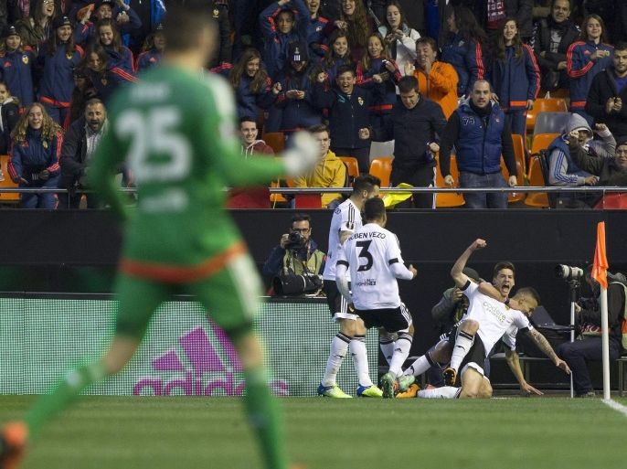 Valencia FC's striker Santi Mina (2R) jubilates with his team mates his goal against Athletic Bilbao during the UEFA Europa League Round of 16 second leg soccer match played at Mestalla stadium in Valencia, eastern of Spain on 17 March 2016.