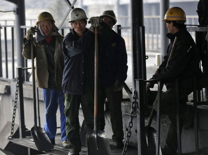 A picture made available on 05 March 2016 of Chinese workers working on a transport line in a coal mine in Fangshan district on the outskirts of Beijing, China, 04 March 2016. While the Chinese Government assured at the National People's Congress on 05 March that they will address the issue of the 'zombie enterprises' proactively yet prudently, thousands of workers of one of the most affected sectors, the coal industry, are about to be made redundant across the country. This situation is particularly noticeable in the Fanghsan district, the 'coal storehouse' of Beijing, where workers are starting to wonder what they will do after their factories shut down to address the overcapacity of the sector.