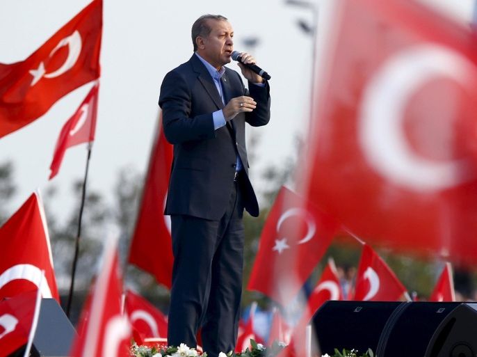 Turkey's President Tayyip Erdogan makes a speech during a rally against recent Kurdish militant attacks on Turkish security forces in Istanbul, Turkey, in this September 20, 2015 file photo. A conference underway in Kurdish-controlled northern Syria aims to approve a "Federal Democratic" system of government for the area. REUTERS/Murad Sezer/Files