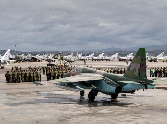A handout picture made available by the Russian Defence Ministry shows Russian warplanes and military personnel at the the Syrian Hmeymim airbase, outside Latakia, Syria, 15 March 2016. First group of Russian warplanes left the Hmeymim airbase for permanent location airfields in Russia. Russian President Vladimir Putin ordered the withdrawal of the majority of Russian troops from Syria on March 15. EPA/RUSSIAN DEFENCE MINISTRY / HANDOUT