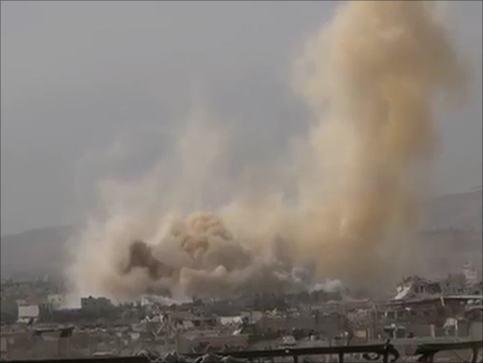 ‪قصف سابق على داريا ببراميل متفجرة‬ (ناشطون)