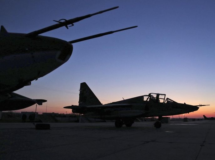 Russian Su-25 ground attack jets are parked after returning from Syria, at a Russian air base in Primorsko-Akhtarsk, southern Russia, Wednesday, March 16, 2016. More Russian planes returned from Syria on Wednesday, two days after President Vladimir Putin ordered Russian military to withdraw most of its fighting forces from Syria, signaling an end to Russia's five-and-a-half month air campaign.(Olga Balashova/Russian Defense Ministry Press Service via AP)