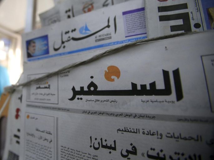 A copy of Lebanese newspaper As-Safir is displayed in front of other newspapers at a shop in Sidon, southern Lebanon March 24, 2016. REUTERS/Ali Hashisho
