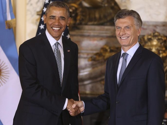 President of Argentina Mauricio Macri (R) welcomes US President Barack Obama at the Casa Rosada in Buenos Aires, Argentina, 23 March 2016. Obama is visiting Argentina following a historic visit to Cuba.