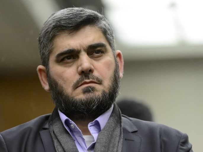 Chief negotiator for the main Syrian opposition body, Army of Islam, Mohammed Alloush attends a press conference after Syrian peace talks, at the President Wilson hotel in Geneva, Switzerland, Wednesday, Feb.3, 2016. U.N. Special Envoy for Syria Staffan de Mistura announced Wednesday there would be a "temporary pause" in the indirect peace talks between the government and opposition, saying the process will resume Feb. 25. (Martial Trezzini/ Keystone via AP)