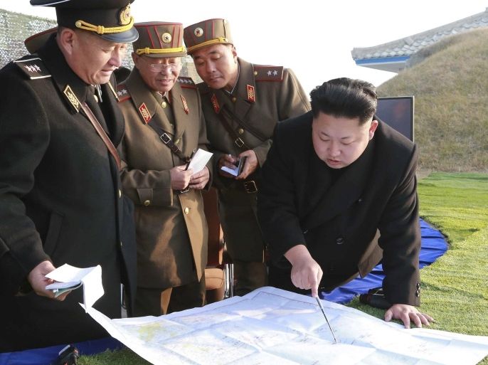 North Korean leader Kim Jong Un organizes and guides a combined joint drill of the units under KPA Combined Units 572 and 630 in this undated file photo released by North Korea's Korean Central News Agency (KCNA) in Pyongyang November 23, 2014. North Korea fired two short-range ballistic missiles into the sea off its east coast city of Wonsan early on March 10, 2016 flying approximately 500 km (300 miles), South Korea's military said. REUTERS/KCNA/Files ATTENTION EDITORS - THIS PICTURE WAS PROVIDED BY A THIRD PARTY. REUTERS IS UNABLE TO INDEPENDENTLY VERIFY THE AUTHENTICITY, CONTENT, LOCATION OR DATE OF THIS IMAGE. FOR EDITORIAL USE ONLY. NOT FOR SALE FOR MARKETING OR ADVERTISING CAMPAIGNS. THIS PICTURE IS DISTRIBUTED EXACTLY AS RECEIVED BY REUTERS, AS A SERVICE TO CLIENTS. NO THIRD PARTY SALES. NOT FOR USE BY REUTERS THIRD PARTY DISTRIBUTORS. SOUTH KOREA OUT. NO COMMERCIAL OR EDITORIAL SALES IN SOUTH KOREA