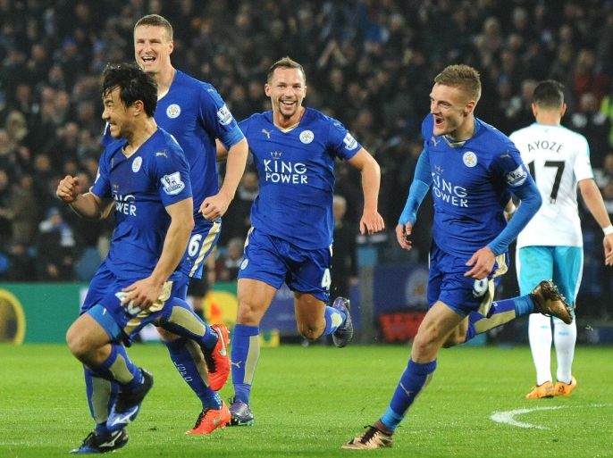 Leicester’s Shinji Okazaki, front, celebrates after scoring during the English Premier League soccer match between Leicester City and Newcastle United at the King Power Stadium in Leicester, England, Monday, March 14, 2016. (AP Photo/Rui Vieira)
