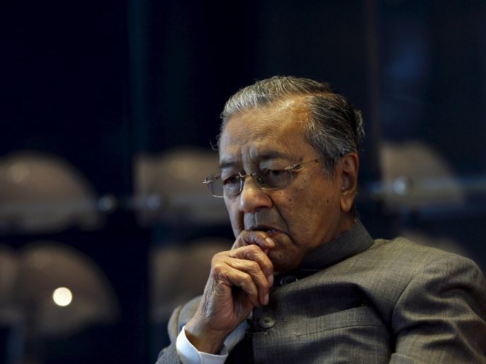 Malaysia's former prime minister Mahathir Mohamad during an interview with Reuters at his office in Petronas Towers, Kuala Lumpur, Malaysia, October 22, 2015. Mahathir conceded on Thursday that the chances of unseating Prime Minister Najib Razak before elections in 2018 are slim, despite his rallying cries for a "people's power" movement to topple the country's leader. The 90-year-old statesman, who led Malaysia for 22 years, has called on Najib to step down following allegations of corruption and mismanagement at state-owned fund 1Malaysia Development Berhad (1MDB). To match Interview MALAYSIA-POLITICS/MAHATHIR REUTERS/Olivia Harris