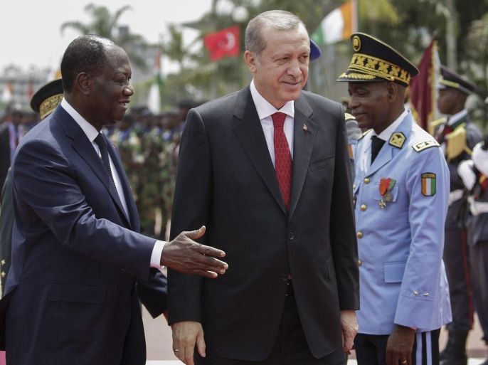 Turkish President, Recep Tayyip Erdogan (2-L) walks with Alassane Ouattara (L) President of the Ivory Coast, at the Presidential palace in Abidjan, Ivory Coast, 29 February 2016. President Erdogan is on an official two day visit to the Ivory Coast.