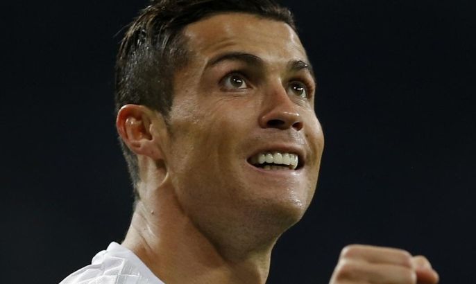 Real Madrid’s Cristiano Ronaldo celebrates scoring his side's 4th goal during a Champions League group A soccer match between Real Madrid and Malmo at the Santiago Bernabeu stadium in Madrid, Tuesday, Dec. 8, 2015. (AP Photo/Francisco Seco)