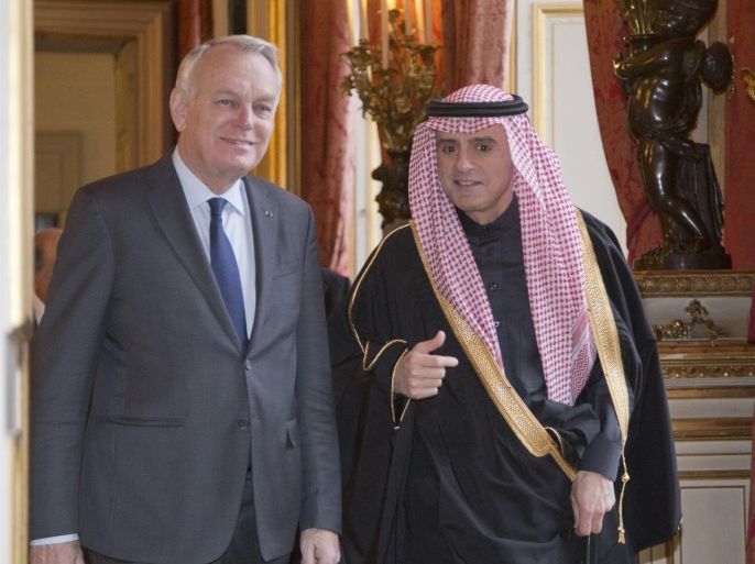 French Foreign Minister Jean-Marc Ayrault , left, arrive with Saudi Arabia's foreign minister Adel Al-Jubeir prior to their meeting at the Foreign Ministry in Paris Friday , March 4, 2016. High-level international discussions about Syria have intensified since the nearly week-old cease-fire went into effect, although it does not include fighters from the Islamic State group. (AP Photo/Jacques Brinon)