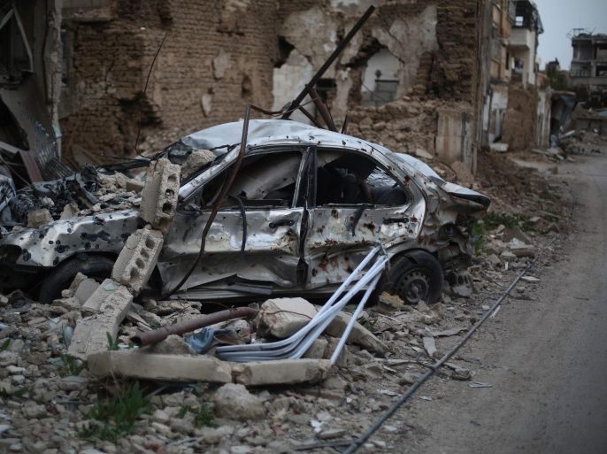 A photograph made available on 10 March 2016 shows a destroyed car in the neighborhood of Jobar, east of Damascus, Syria, 09 March 2016. Jobar is held by the opposing Free Syrian Army and has been bombed periodically for the past three years, the destroyed neighborhood is quiet since the ceasefire agreement that was brokered last month in this war-torn country.