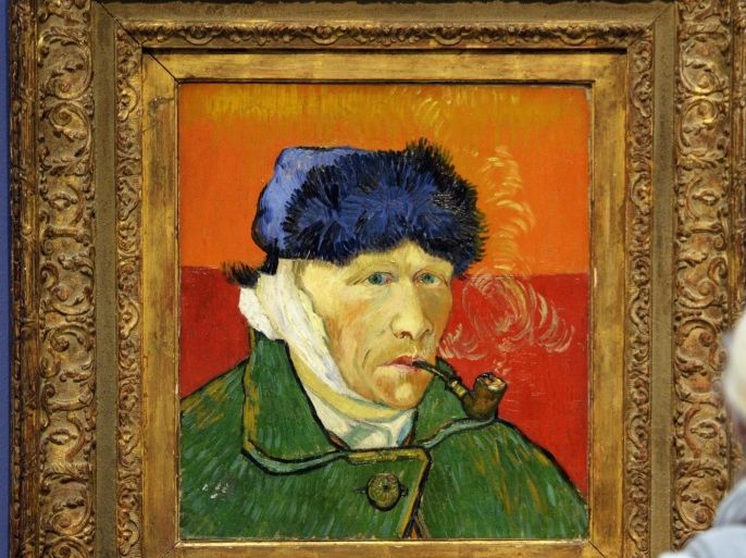 A visitor looks at a self portrait from 1889 by Dutch artist Vincent van Gogh during the opening of the exhibition 'From Matisse to the Blue Rider. Expressionism in Germany and France', in Zurich, Switzerland, 06 February 2014. The exposition runs from 07 February to 11 May.